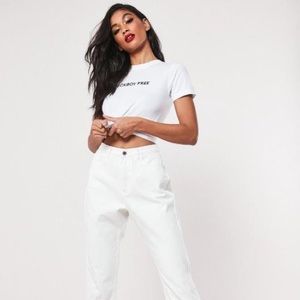 White high waisted raw hem straight leg jeans